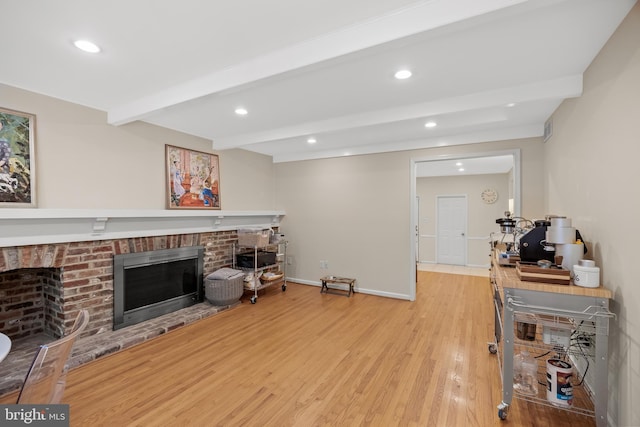 4 Rooftree Rd, Cherry Hill, NJ 08003 - living area featuring beamed ceiling, a brick fireplace, light wood-style flooring, recessed lighting, and baseboards