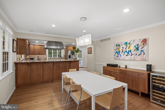 4 Rooftree Rd, Cherry Hill, NJ 08003 - dining area with beverage cooler, light wood-style floors, ornamental molding, recessed lighting, and baseboards