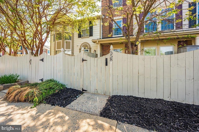 558 Hollyberry Way, Frederick, MD 21703 - exterior space with brick siding, a gate, and fence