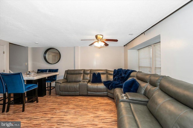 558 Hollyberry Way, Frederick, MD 21703 - living room with visible vents, a ceiling fan, and wood finished floors