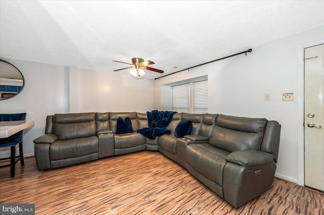 558 Hollyberry Way, Frederick, MD 21703 - living area with baseboards, a ceiling fan, and wood finished floors
