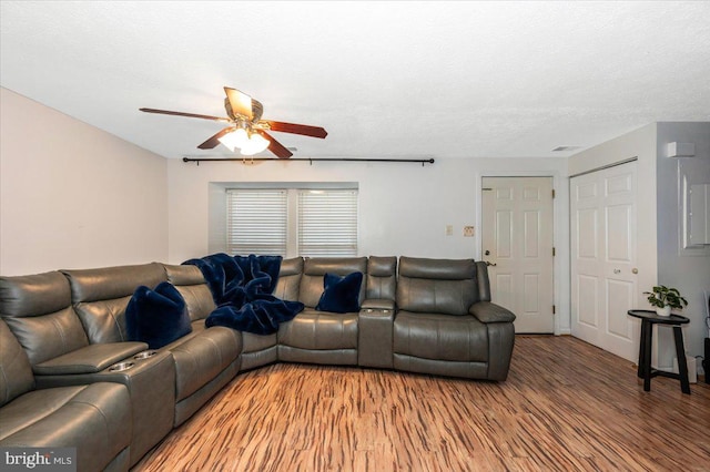 558 Hollyberry Way, Frederick, MD 21703 - living area with ceiling fan and light wood-style flooring