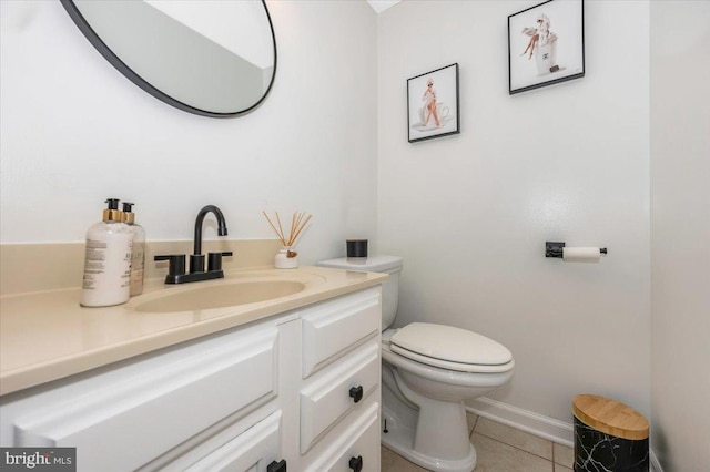 558 Hollyberry Way, Frederick, MD 21703 - half bathroom with toilet, baseboards, tile patterned flooring, and vanity