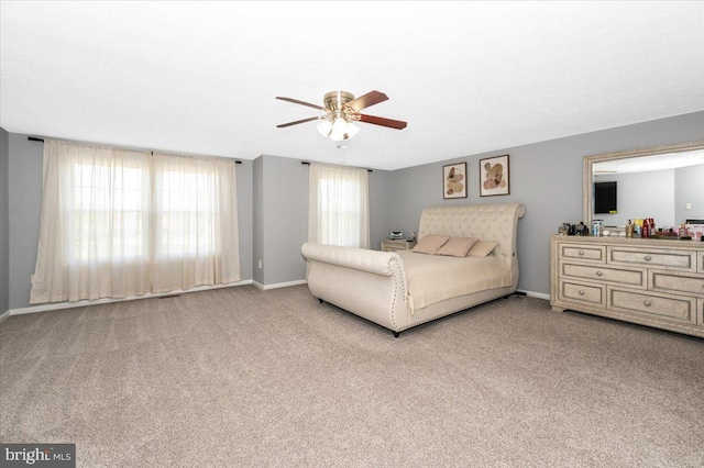 558 Hollyberry Way, Frederick, MD 21703 - carpeted bedroom with a ceiling fan and baseboards