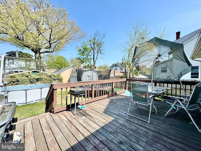 436 Norway Ave, Hamilton, NJ 08629 - deck with outdoor dining space, an outdoor structure, and a storage shed
