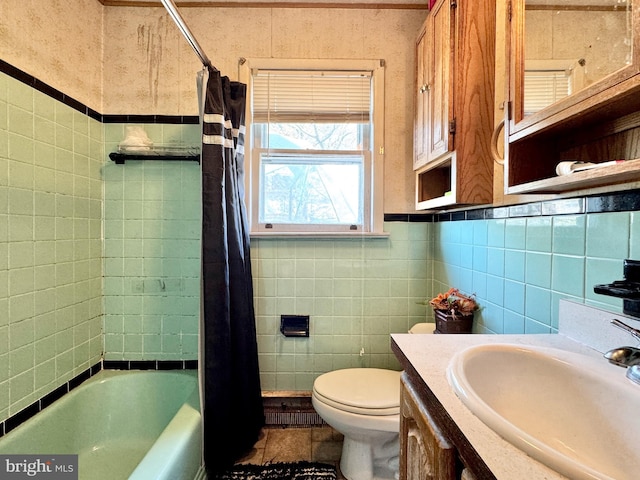 436 Norway Ave, Hamilton, NJ 08629 - bathroom with shower / bathtub combination with curtain, vanity, toilet, and tile walls