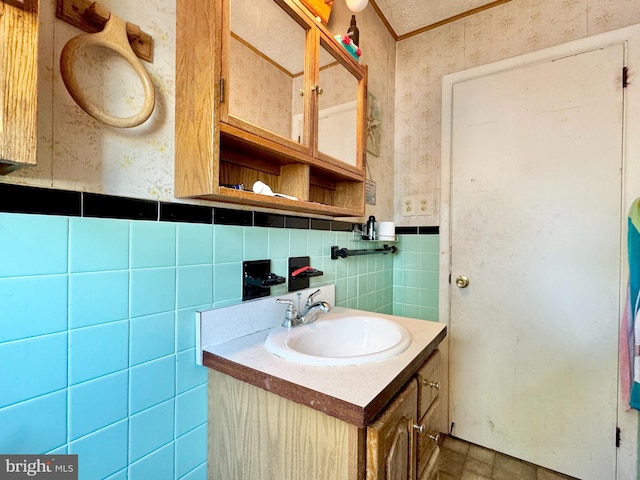 436 Norway Ave, Hamilton, NJ 08629 - half bath with wallpapered walls, wainscoting, tile walls, ornamental molding, and vanity