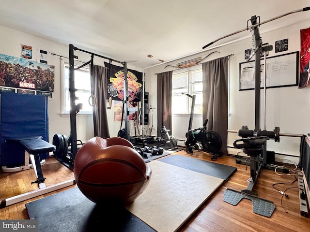 436 Norway Ave, Hamilton, NJ 08629 - workout area featuring hardwood / wood-style flooring and a baseboard radiator