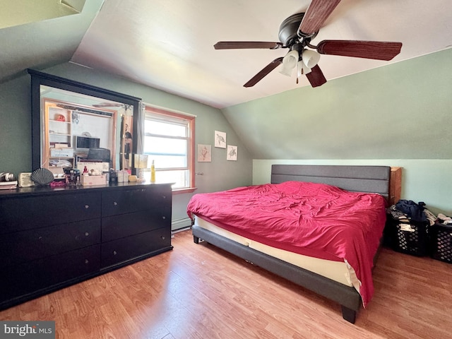 436 Norway Ave, Hamilton, NJ 08629 - bedroom featuring light wood finished floors, a ceiling fan, baseboard heating, and vaulted ceiling
