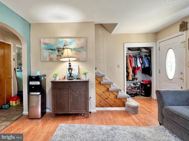 436 Norway Ave, Hamilton, NJ 08629 - entryway featuring arched walkways, stairs, wood finished floors, and baseboards