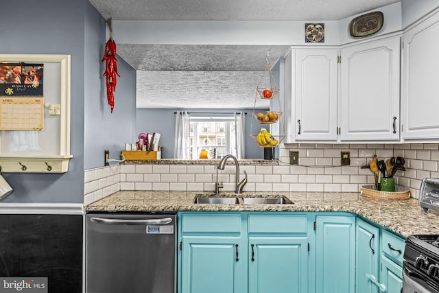kitchen featuring a sink, a textured ceiling, white cabinetry, tasteful backsplash, and stainless steel dishwasher