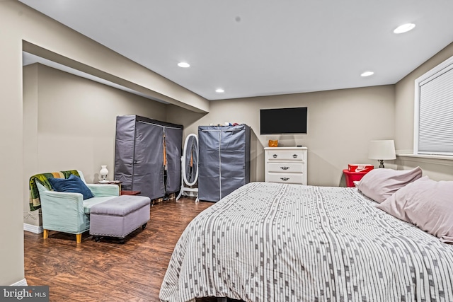 bedroom featuring recessed lighting and wood finished floors