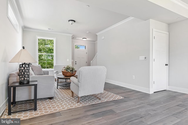 3519 Cedar Dr, Edgewater, MD 21037 - living area with baseboards, ornamental molding, wood finished floors, and visible vents