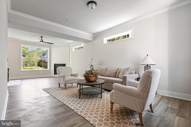 3519 Cedar Dr, Edgewater, MD 21037 - living room with crown molding, baseboards, ceiling fan, and wood finished floors