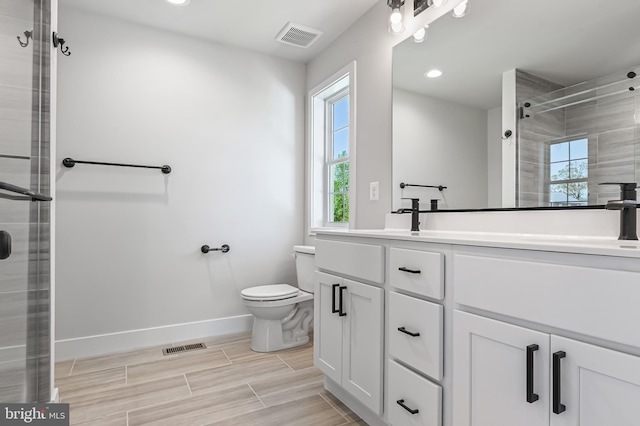 3519 Cedar Dr, Edgewater, MD 21037 - full bathroom featuring toilet, baseboards, visible vents, and a shower stall