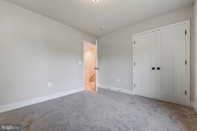 3519 Cedar Dr, Edgewater, MD 21037 - unfurnished bedroom with baseboards, carpet, and a closet
