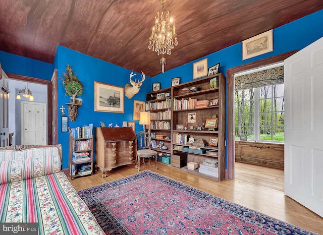 227 Jackson Rd, Cochranville, PA 19330 - sitting room featuring wood finished floors, a chandelier, and lofted ceiling