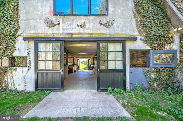 227 Jackson Rd, Cochranville, PA 19330 - property entrance with stucco siding