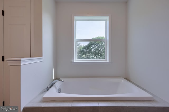 bathroom featuring a garden tub