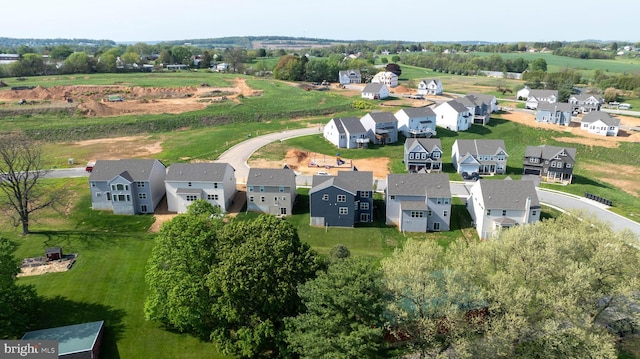birds eye view of property with a residential view