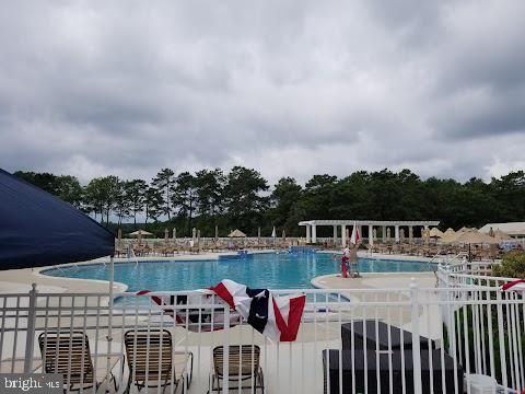 community pool featuring a patio