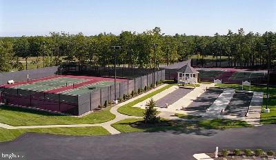 view of community featuring fence