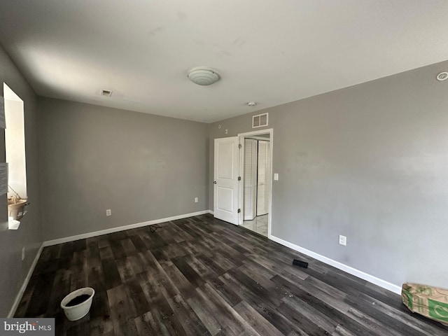 2108 Ridge Ave, Philadelphia, PA 19121 - spare room with baseboards, dark wood-type flooring, and visible vents