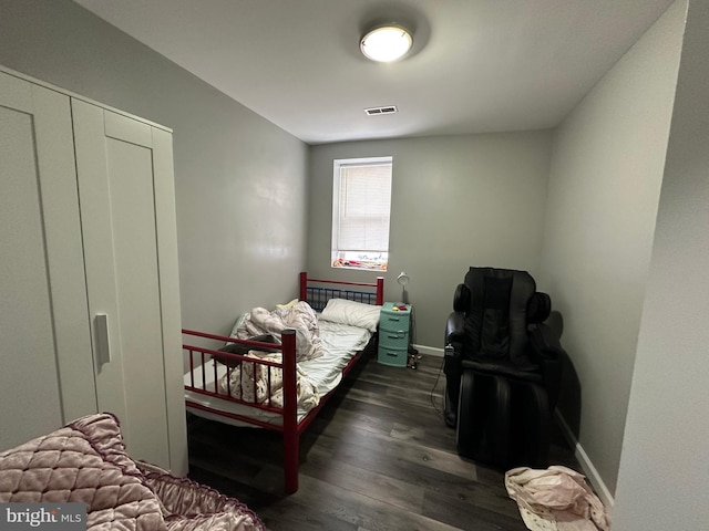 2108 Ridge Ave, Philadelphia, PA 19121 - bedroom with baseboards, visible vents, and dark wood-style floors