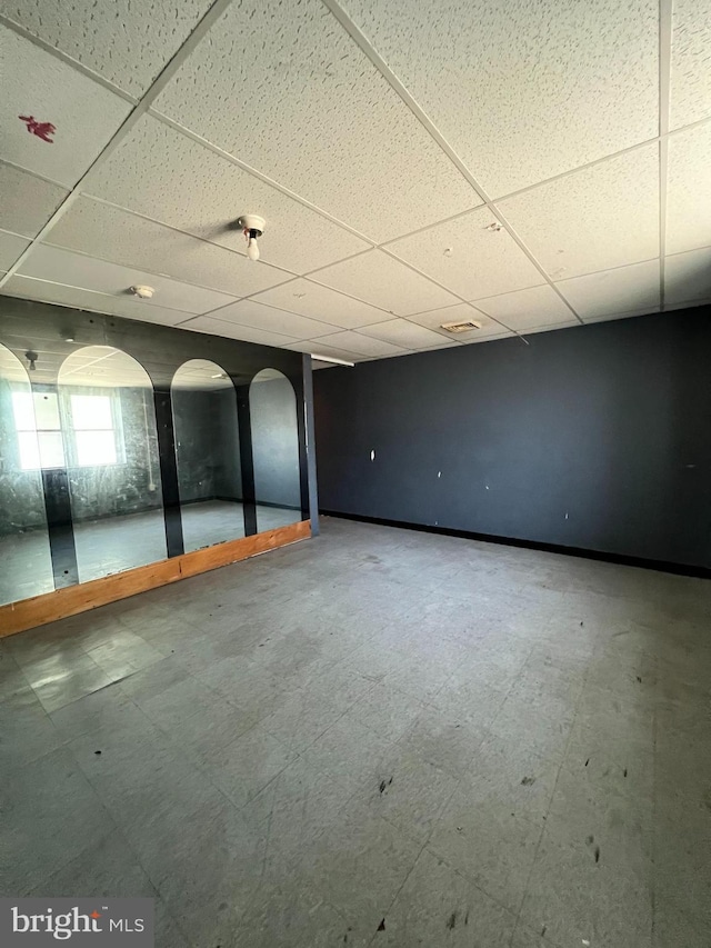 3038 W 2nd St, Chester, PA 19013 - basement with tile patterned floors, baseboards, and a drop ceiling