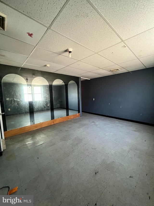3038 W 2nd St, Chester, PA 19013 - basement with visible vents, tile patterned floors, baseboards, and a drop ceiling