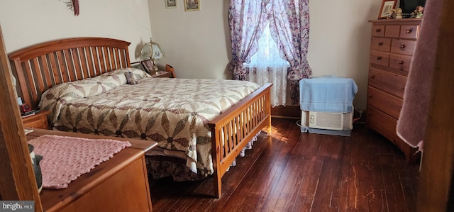 bedroom featuring wood-type flooring
