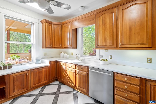 410 Altamont Cir, Charlottesville, VA 22902 - kitchen featuring a sink, dishwasher, brown cabinets, and light countertops
