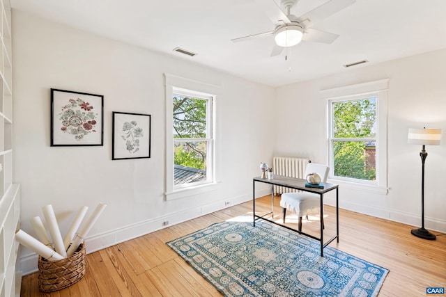 410 Altamont Cir, Charlottesville, VA 22902 - office space featuring radiator, wood-type flooring, visible vents, and baseboards