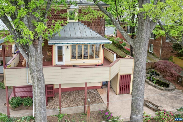 410 Altamont Cir, Charlottesville, VA 22902 - exterior space featuring metal roof, a standing seam roof, and brick siding