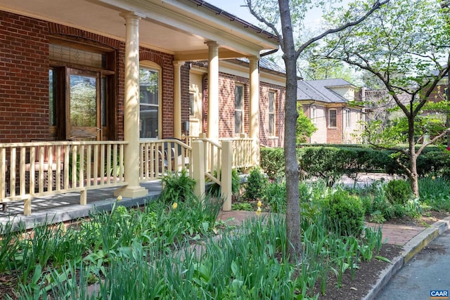 410 Altamont Cir, Charlottesville, VA 22902 - exterior space featuring covered porch and brick siding