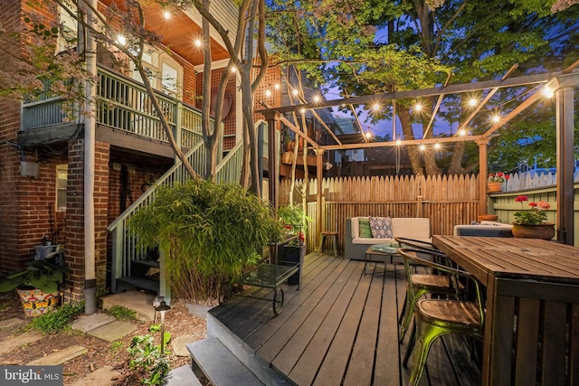 wooden deck featuring fence
