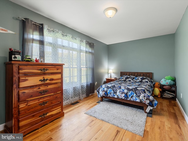 2004 State Road 259 N, Wardensville, WV 26851 - bedroom featuring visible vents, baseboards, and wood finished floors