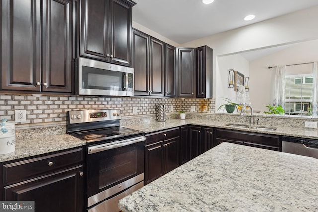 155 Tollerton Trl, Falling Waters, WV 25419 - kitchen featuring stainless steel appliances, a sink, decorative backsplash, light stone counters, and recessed lighting