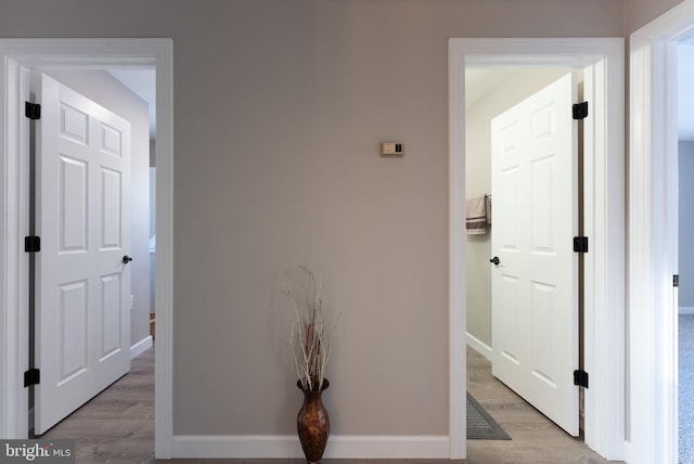 5 Greenmeadow Ln, Whiting, NJ 08759 - corridor featuring baseboards and light wood finished floors