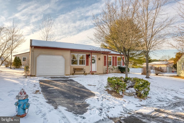 5 Greenmeadow Ln, Whiting, NJ 08759 - single story home featuring a garage and aphalt driveway