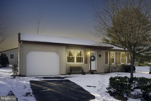 5 Greenmeadow Ln, Whiting, NJ 08759 - ranch-style house featuring an attached garage and aphalt driveway