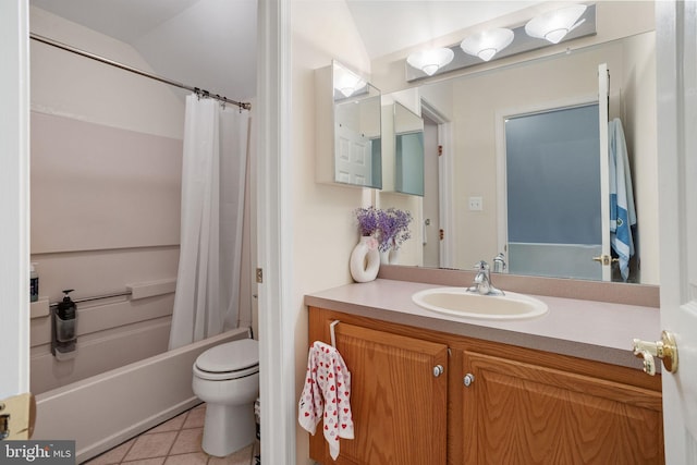 full bathroom with shower / bath combo with shower curtain, vanity, toilet, and tile patterned floors