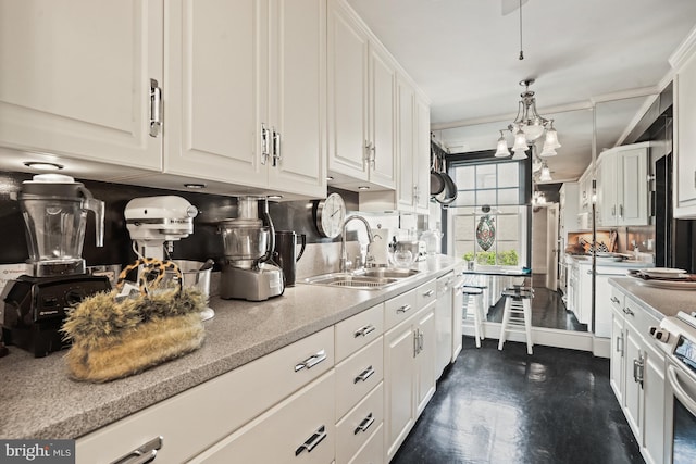 3901 Connecticut Ave NW Unit 402, Washington, DC 20008 - kitchen featuring a sink, white cabinetry, stainless steel range, and dishwasher