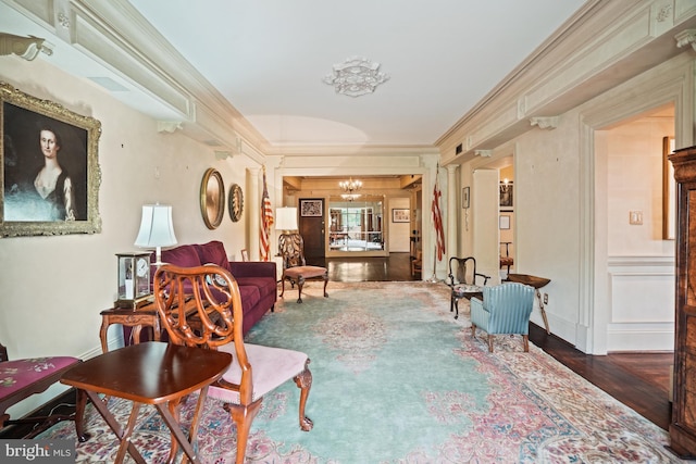 3901 Connecticut Ave NW Unit 402, Washington, DC 20008 - sitting room with crown molding, a chandelier, and wood finished floors