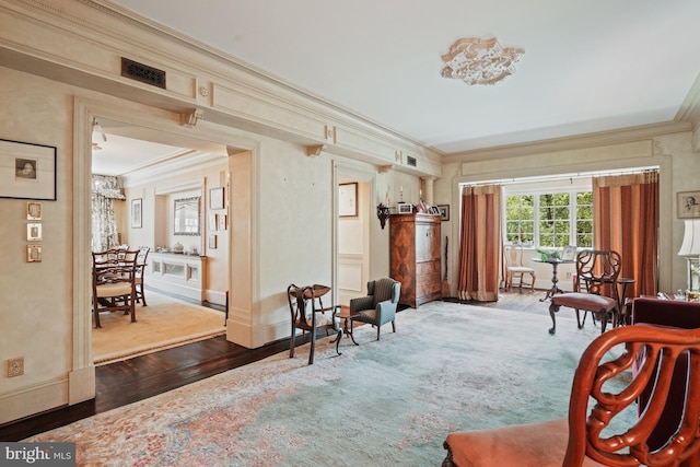 3901 Connecticut Ave NW Unit 402, Washington, DC 20008 - sitting room with baseboards, visible vents, crown molding, and wood finished floors