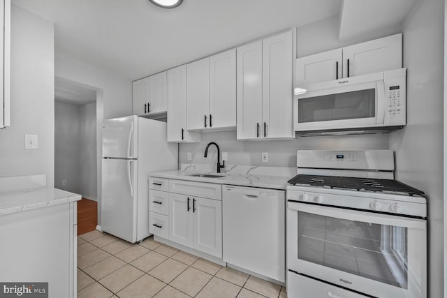 2456 Sun Valley Cir Unit 7-M, Silver Spring, MD 20906 - kitchen with a sink, white cabinetry, light stone countertops, white appliances, and light tile patterned flooring