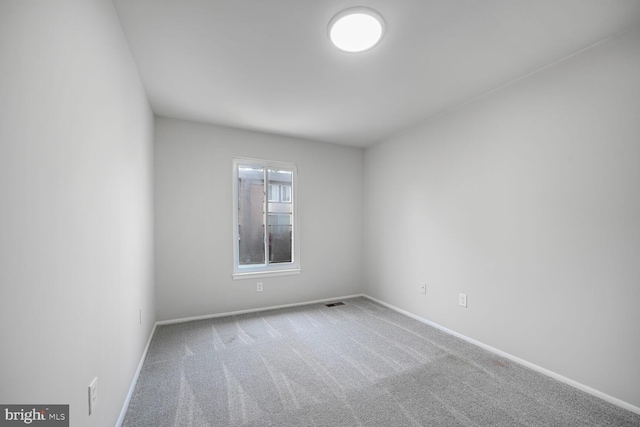 2456 Sun Valley Cir Unit 7-M, Silver Spring, MD 20906 - spare room featuring baseboards and carpet flooring