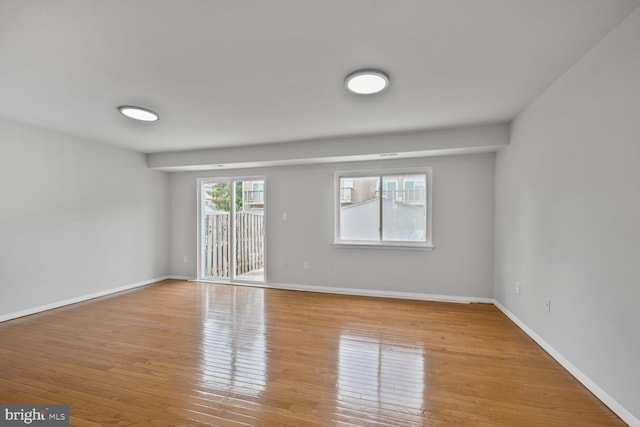2456 Sun Valley Cir Unit 7-M, Silver Spring, MD 20906 - spare room with baseboards and light wood-style floors