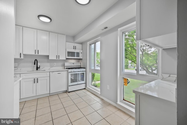 2456 Sun Valley Cir Unit 7-M, Silver Spring, MD 20906 - kitchen with white cabinetry, white appliances, visible vents, and a sink