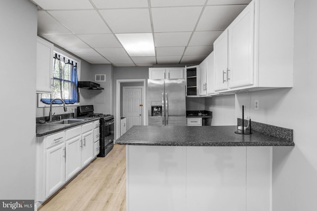 412 Market St, Trenton, NJ 08611 - kitchen with open shelves, a sink, dark countertops, black range with gas cooktop, and stainless steel fridge with ice dispenser